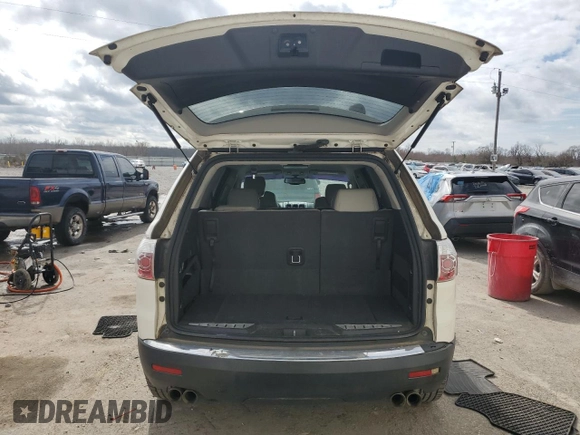 2007 GMC Acadia SLT z VIN 1GKER23727J159868, wystawiony jako Copart lot #43948785 z przebiegiem 217 693 mil mil oraz Szkoda całkowita • Salvage title. Historia ofert i sprzedaży dostępna na DreamBid. Obrazek 6.