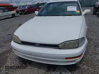 1992 Toyota Camry LE z VIN 4T1SK12E0NU021654, wystawiony jako IAAI lot #42305378 z przebiegiem 305 421 mil mil oraz . Historia ofert i sprzedaży dostępna na DreamBid. Obrazek 12.