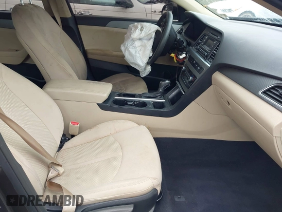 2015 Hyundai Sonata SE z VIN 5NPE24AFXFH150090, wystawiony jako IAAI lot #42341428 z przebiegiem 133 157 mil mil oraz . Historia ofert i sprzedaży dostępna na DreamBid. Obrazek 5.