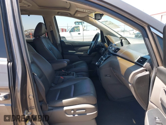2012 Honda Odyssey Touring with VIN 5FNRL5H93CB109394, listed as a IAAI auction lot 42280018 with 190,412 mi miles and . Bid and sale history available at DreamBid. Image 5.