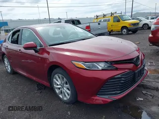 2019 Toyota Camry LE with VIN 4T1B11HK8KU823736, listed as a IAAI auction lot 42166696 with 21,732 mi miles and . Bid and sale history available at DreamBid. Image 1.