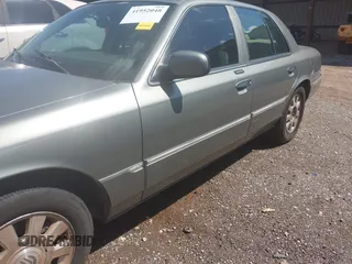 2003 Mercury Grand Marquis LS Premium z VIN 2MEFM75W53X691700, wystawiony jako IAAI lot #41952048 z przebiegiem 208 747 mil mil oraz . Historia ofert i sprzedaży dostępna na DreamBid. Obrazek 6.