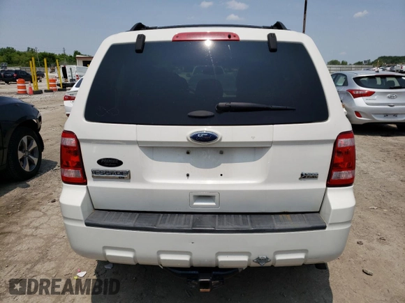 2012 Ford Escape XLT z VIN 1FMCU9DG3CKA41742, wystawiony jako Copart lot #60092135 z przebiegiem 175 330 mil mil oraz Szkoda całkowita • Salvage title. Historia ofert i sprzedaży dostępna na DreamBid. Obrazek 6.
