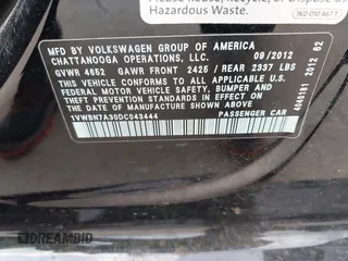 2013 Volkswagen Passat TDI SE with VIN 1VWBN7A30DC043444, listed as a IAAI auction lot 42150639 with 103,628 mi miles. Bid and sale history available at carsss.com. Image 9.