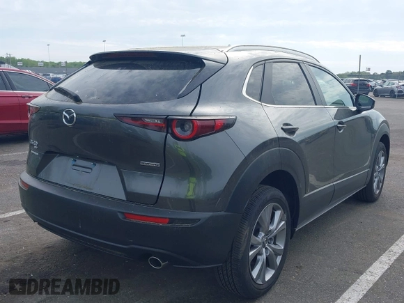 2024 Mazda CX-30 S Carbon Edition with VIN 3MVDMBCM5RM665341, listed as a IAAI auction lot 42180459 with 4,496 mi miles and . Bid and sale history available at DreamBid. Image 4.