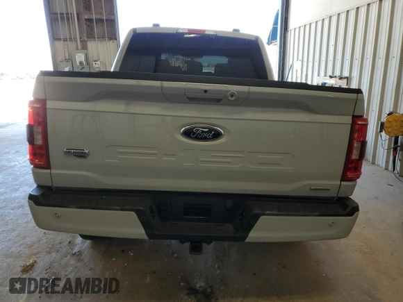 2023 Ford F-150 XL with VIN 1FTFW1E88PFD22387, listed as a Copart auction lot 49795405 with 14,057 mi miles and Salvage Title. Bid and sale history available at carsss.com. Image 6.
