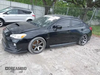 2016 Subaru WRX with VIN JF1VA1B65G9801044, listed as a IAAI auction lot 41973939 with 82,420 mi miles. Bid and sale history available at carsss.com. Image 14.