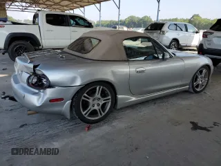 2004 Mazda MX-5 Miata LS z VIN JM1NB353X40404238, wystawiony jako Copart lot #61601895 z przebiegiem 110 549 mil mil oraz Szkoda całkowita • Salvage title. Historia ofert i sprzedaży dostępna na DreamBid. Obrazek 3.