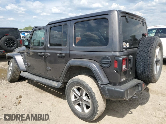 2019 Jeep Wrangler Unlimited Sahara with VIN 1C4HJXENXKW521630, listed as a Copart auction lot 56196145 with 56,753 mi miles and Salvage title. Bid and sale history available at DreamBid. Image 2.