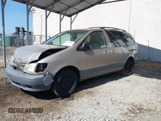 2002 Toyota Sienna LE with VIN 4T3ZF13C82U465335, listed as a IAAI auction lot 40274809 with 178,560 mi miles and . Bid and sale history available at DreamBid. Image 2.
