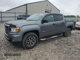 2021 GMC Canyon 4WD AT4 z VIN 1GTG6FEN1M1103416, wystawiony jako Copart lot #58038435 z przebiegiem 56 723 mil mil oraz Szkoda całkowita • Salvage title. Historia ofert i sprzedaży dostępna na DreamBid. Obrazek 1.