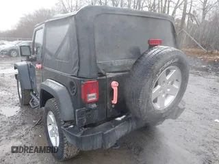2017 Jeep Wrangler Sport z VIN 1C4GJWAG1HL502374, wystawiony jako IAAI lot #41938257 z przebiegiem 95 469 mil mil oraz . Historia ofert i sprzedaży dostępna na DreamBid. Obrazek 6.