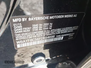 2015 BMW 7 Series 750Li xDrive with VIN WBAYF8C56FD654698, listed as a IAAI auction lot 41229313 with 120,238 mi miles and . Bid and sale history available at carsss.com. Image 9.