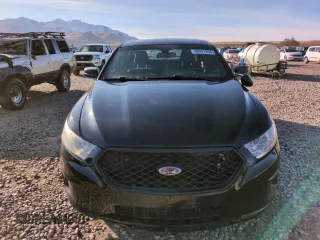 2015 Ford Police Interceptor with VIN 1FAHP2MT6FG144138, listed as a Copart auction lot 80991994 with 108,401 mi miles and Salvage title. Bid and sale history available at DreamBid. Image 5.