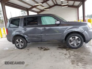 2015 Honda Pilot EX-L with VIN 5FNYF4H50FB030652, listed as a IAAI auction lot 41937401 with 91,429 mi miles and . Bid and sale history available at carsss.com. Image 13.
