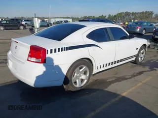 2010 Dodge Charger Police with VIN 2B3AA4CT5AH161604, listed as a IAAI auction lot 41814567 with 195,507 mi miles and . Bid and sale history available at DreamBid. Image 4.