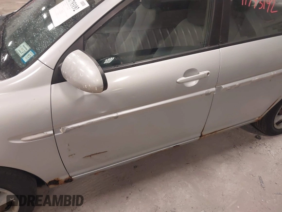 2006 Hyundai Accent GLS with VIN KMHCN46C06U004764, listed as a IAAI auction lot 41793192 with 182,841 mi miles. Bid and sale history available at carsss.com. Image 6.