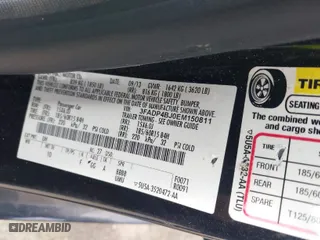 2014 Ford Fiesta SE with VIN 3FADP4BJ0EM150811, listed as a IAAI auction lot 42060983 with 180,952 mi miles. Bid and sale history available at carsss.com. Image 9.