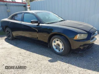 2012 Dodge Charger RT with VIN 2C3CDXCT3CH102803, listed as a IAAI auction lot 41977182 with 128,445 mi miles. Bid and sale history available at carsss.com. Image 1.