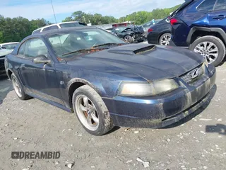 2003 Ford Mustang GT Deluxe z VIN 1FAFP42X23F380022, wystawiony jako IAAI lot #42236065 z przebiegiem 126 175 mil mil oraz . Historia ofert i sprzedaży dostępna na DreamBid. Obrazek 1.