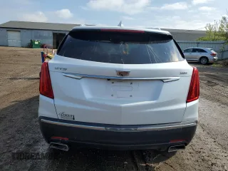 2017 Cadillac XT5 FWD with VIN 1GYKNARS0HZ157551, listed as a Copart auction lot 55281725 with 144,077 mi miles and Clean title. Bid and sale history available at DreamBid. Image 6.