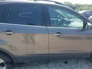 2013 Ford Escape SE with VIN 1FMCU0GX6DUB29519, listed as a IAAI auction lot 42281464 with 129,671 mi miles and . Bid and sale history available at DreamBid. Image 13.