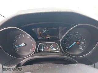 2015 Ford Focus Titanium with VIN 1FADP3N27FL228549, listed as a IAAI auction lot 41912941 with 69,025 mi miles. Bid and sale history available at carsss.com. Image 7.