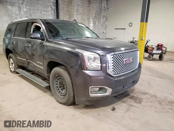 2015 GMC Yukon Denali with VIN 1GKS2CKJ2FR677604, listed as a Copart auction lot 51714505 with 146,648 mi miles and Salvage Title. Bid and sale history available at carsss.com. Image 14.