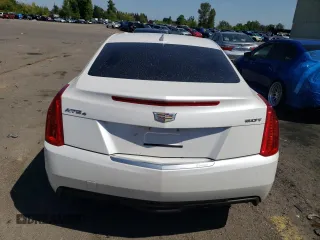2016 Cadillac ATS AWD z VIN 1G6AG1RX3G0131622, wystawiony jako Copart lot #55354585 z przebiegiem 87 073 mil mil oraz Czysty tytuł • Clean title. Historia ofert i sprzedaży dostępna na DreamBid. Obrazek 6.