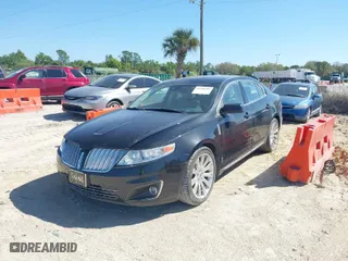 2009 Lincoln MKS with VIN 1LNHM94R39G625996, listed as a IAAI auction lot 41698785 with 99,696 mi miles. Bid and sale history available at carsss.com. Image 2.