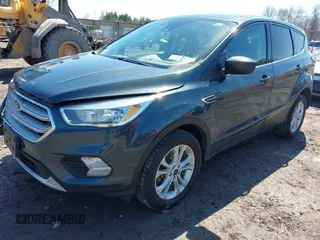 2019 Ford Escape SE z VIN 1FMCU9GDXKUC06609, wystawiony jako IAAI lot #42061974 z przebiegiem 148 064 mil mil oraz . Historia ofert i sprzedaży dostępna na DreamBid. Obrazek 2.