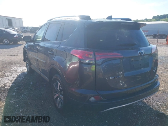 2018 Toyota RAV4 XLE z VIN JTMWFREV1JJ197662, wystawiony jako IAAI lot #42167382 z przebiegiem 64 826 mil mil oraz . Historia ofert i sprzedaży dostępna na DreamBid. Obrazek 3.