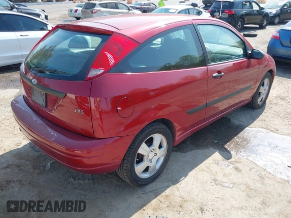2003 Ford Focus ZX3 with VIN 3FAHP31323R119865, listed as a IAAI auction lot 42738163 with 64,008 mi miles and . Bid and sale history available at DreamBid. Image 4.