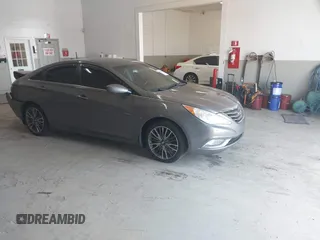 2013 Hyundai Sonata GLS with VIN 5NPEB4AC9DH608642, listed as a IAAI auction lot 42003556 with 105,448 mi miles and . Bid and sale history available at carsss.com. Image 1.