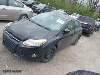 2012 Ford Focus SE with VIN 1FAHP3K27CL455211, listed as a IAAI auction lot 42048868 with 164,474 mi miles. Bid and sale history available at carsss.com. Image 2.