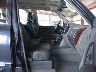 2002 Mitsubishi Montero Limited z VIN JA4MW51R02J056182, wystawiony jako IAAI lot #41997067 z przebiegiem 176 963 mil mil oraz . Historia ofert i sprzedaży dostępna na DreamBid. Obrazek 5.