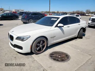 2014 BMW 7 Series 750i с VIN WBAYA8C51ED228303, выставлен на аукционе Copart как лот 50027605 с пробегом 91 419 миль миль и Списание • Salvage title. История ставок и продаж доступна на DreamBid. Изображение 1.