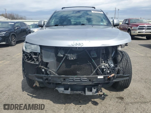 2018 Jeep Grand Cherokee Laredo E with VIN 1C4RJFAG0JC351090, listed as a Copart auction lot 52958635 with 96,956 mi miles and Salvage Title. Bid and sale history available at DreamBid. Image 5.
