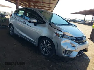 2015 Honda Fit EX-L z VIN 3HGGK5H87FM701187, wystawiony jako IAAI lot #42328414 z przebiegiem 109 225 mil mil oraz . Historia ofert i sprzedaży dostępna na DreamBid. Obrazek 1.