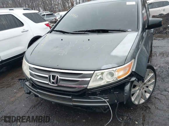 2012 Honda Odyssey Touring with VIN 5FNRL5H98CB089871, listed as a IAAI auction lot 41351447 with 999,999 mi miles. Bid and sale history available at carsss.com. Image 11.