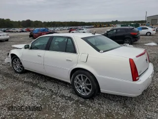 2007 Cadillac DTS Performance z VIN 1G6KD57907U171271, wystawiony jako Copart lot #79007574 z przebiegiem 147 504 mil mil oraz Szkoda całkowita • Salvage title. Historia ofert i sprzedaży dostępna na DreamBid. Obrazek 2.