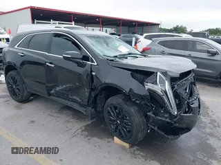 2022 Cadillac XT5 FWD Premium Luxury with VIN 1GYKNCRS6NZ119099, listed as a IAAI auction lot 42359259 with 43,087 mi miles and . Bid and sale history available at DreamBid. Image 1.