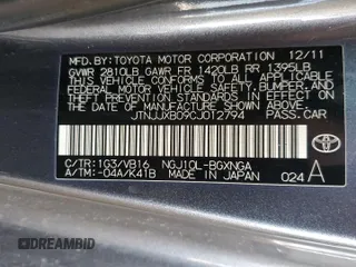2012 Scion iQ z VIN JTNJJXB09CJ012794, wystawiony jako Copart lot #52983435 z przebiegiem 135 927 mil mil oraz Szkoda całkowita • Salvage title. Historia ofert i sprzedaży dostępna na DreamBid. Obrazek 12.