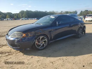 2005 Hyundai Tiburon GT z VIN KMHHN65F85U158764, wystawiony jako Copart lot #80060884 z przebiegiem 121 747 mil mil oraz Tytuł czysty. Historia ofert i sprzedaży dostępna na DreamBid. Obrazek 1.