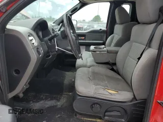 2004 Ford F-150 XL with VIN 1FTRF14524NC39799, listed as a Copart auction lot 59115774 with 156,709 mi miles and Salvage Title. Bid and sale history available at DreamBid. Image 7.