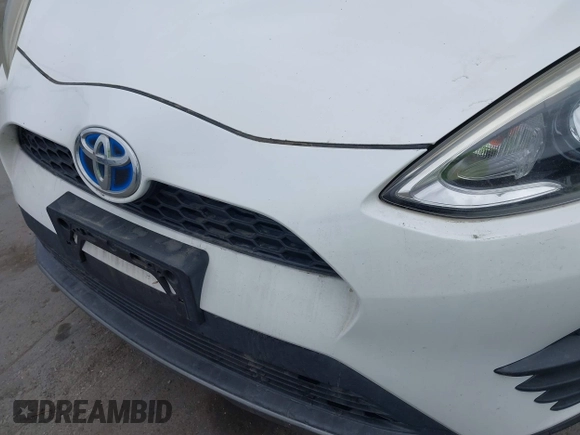 2018 Toyota Prius One with VIN JTDKDTB37J1615520, listed as a IAAI auction lot 42054113 with 76,989 mi miles and . Bid and sale history available at DreamBid. Image 6.