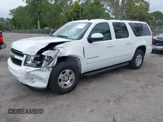 2014 Chevrolet Suburban LT with VIN 1GNSCJE06ER231476, listed as a IAAI auction lot 41768616 with 88,581 mi miles. Bid and sale history available at carsss.com. Image 17.