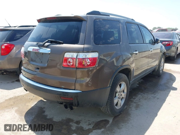 2011 GMC Acadia SL with VIN 1GKKRNED2BJ297121, listed as a IAAI auction lot 42128170 with 130,205 mi miles and . Bid and sale history available at carsss.com. Image 4.