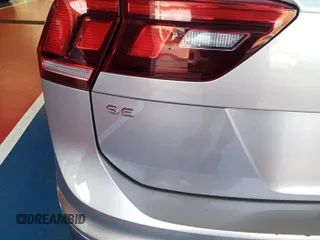 2024 Volkswagen Tiguan SE z VIN 3VV3B7AX7RM105271, wystawiony jako IAAI lot #42752403 z przebiegiem 27 050 mil mil oraz . Historia ofert i sprzedaży dostępna na DreamBid. Obrazek 16.