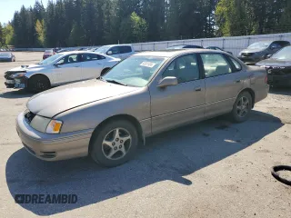 1998 Toyota Avalon XL with VIN 4T1BF18BXWU228989, listed as a Copart auction lot 53821495 with 157,209 mi miles and Salvage Title. Bid and sale history available at DreamBid. Image 1.